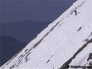 skiers Grands Moulins south face