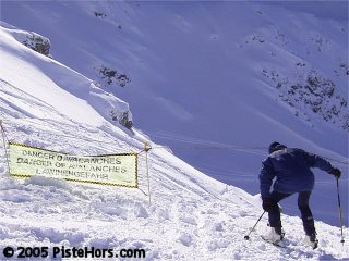 skier ducking ropes