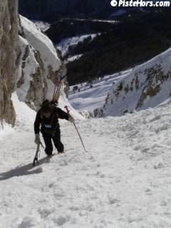 Luc nears the top of the couloir